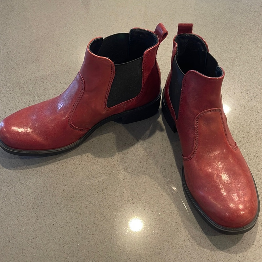 Worn once. Red leather booties from Italy